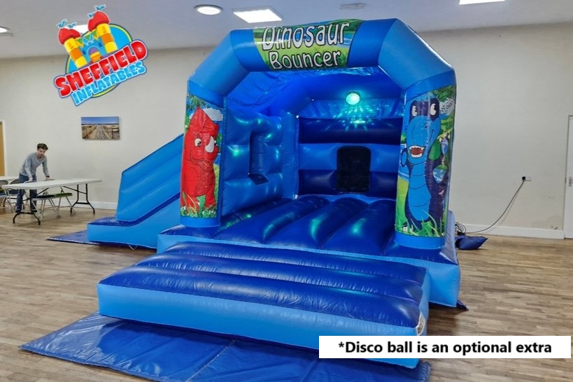 Dinosaur bouncy castle hire with disco ball
