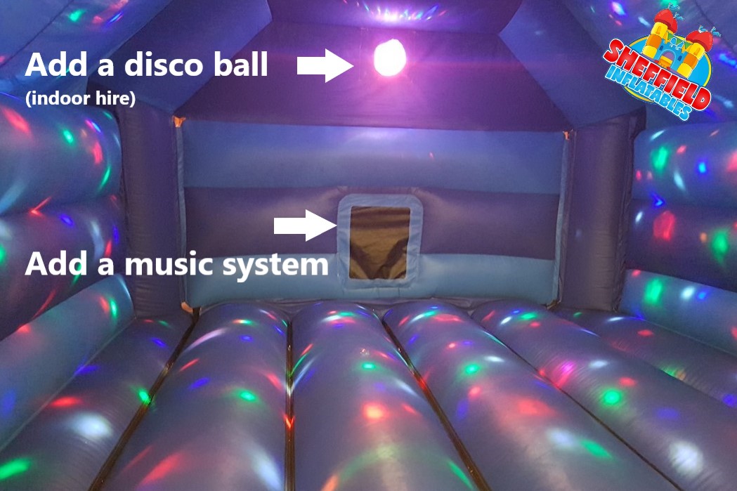 The picture shows a bouncy castle with added disco ball