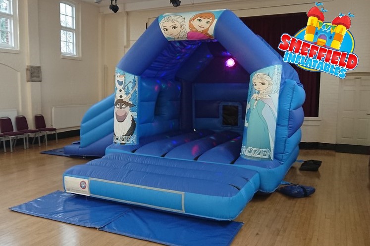 A picture of the bouncy castle with disco ball