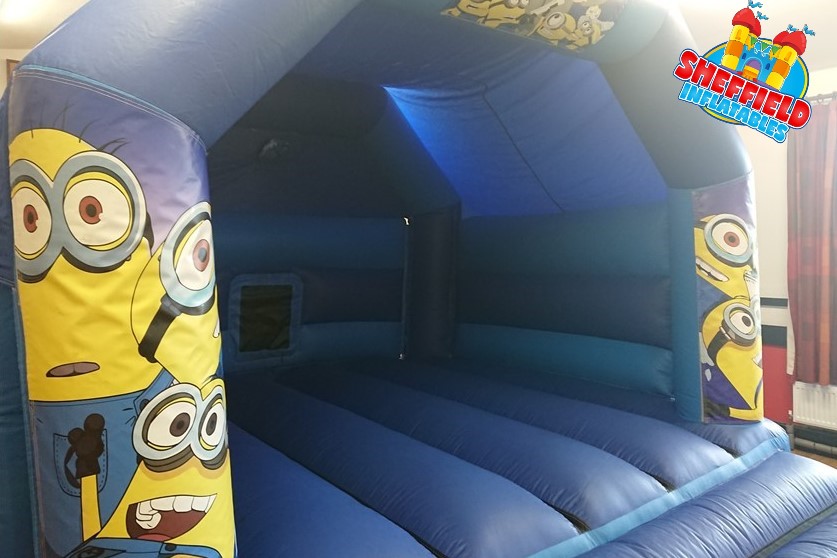 Picture of large minions bouncy castle in Chesterfield