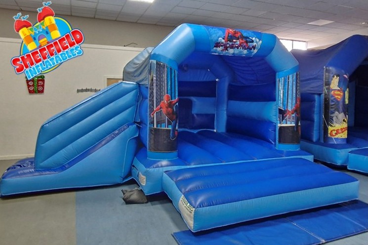 Spiderman bouncy castle with slide