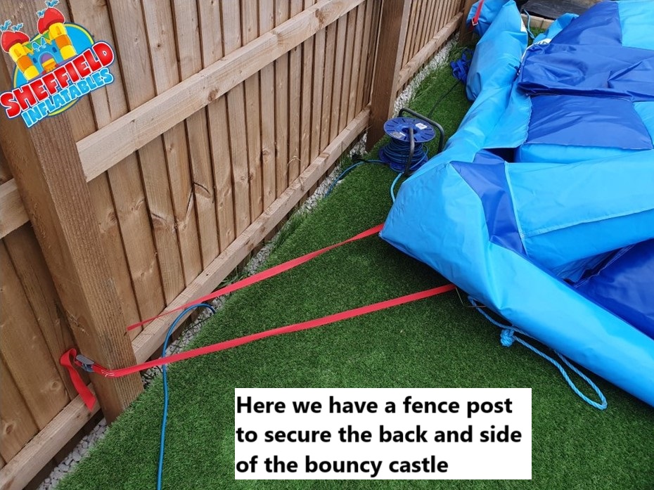 Attaching an inflatable on artificial grass